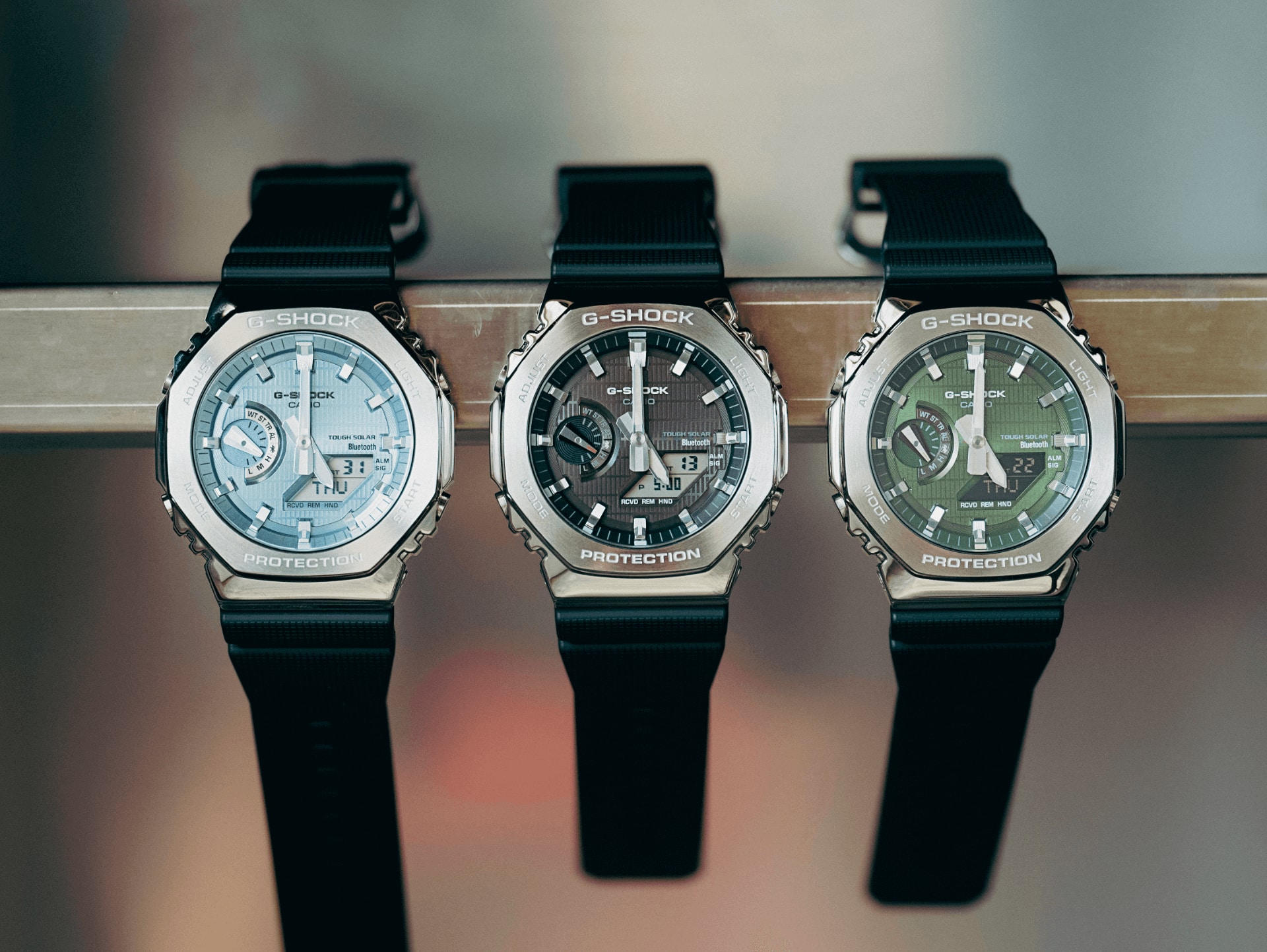 Die Uhren der neuen G-Shock GBM-2100 Serie mit hellblauem, dunkelbraunen und hellgrünen Zifferblatt.