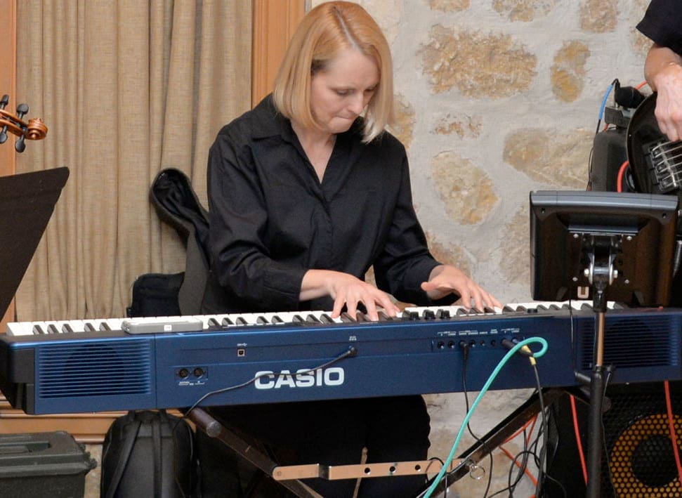 Monika Herzig playing a Privia PX-560 digital piano