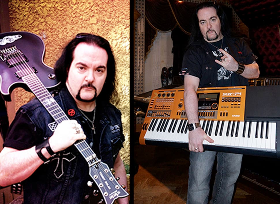 Tommy Bolan Holding Guitar And Piano