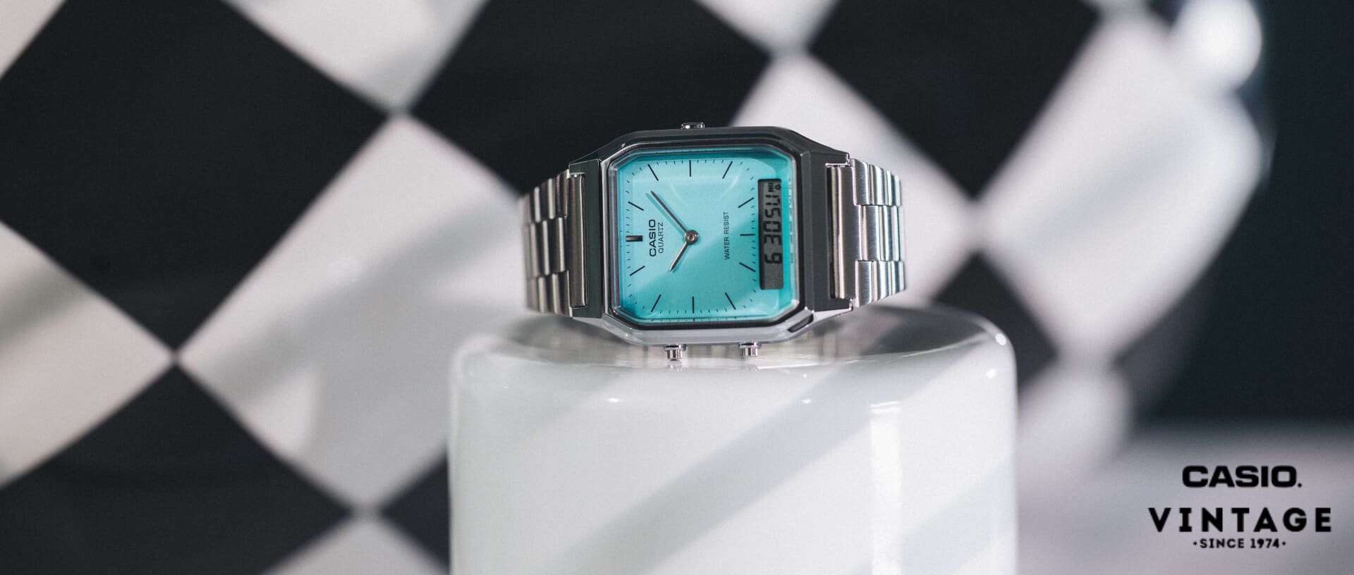 CASIO Vintage Armbanduhr "AQ-230" mit türkisem analogem Zifferblatt