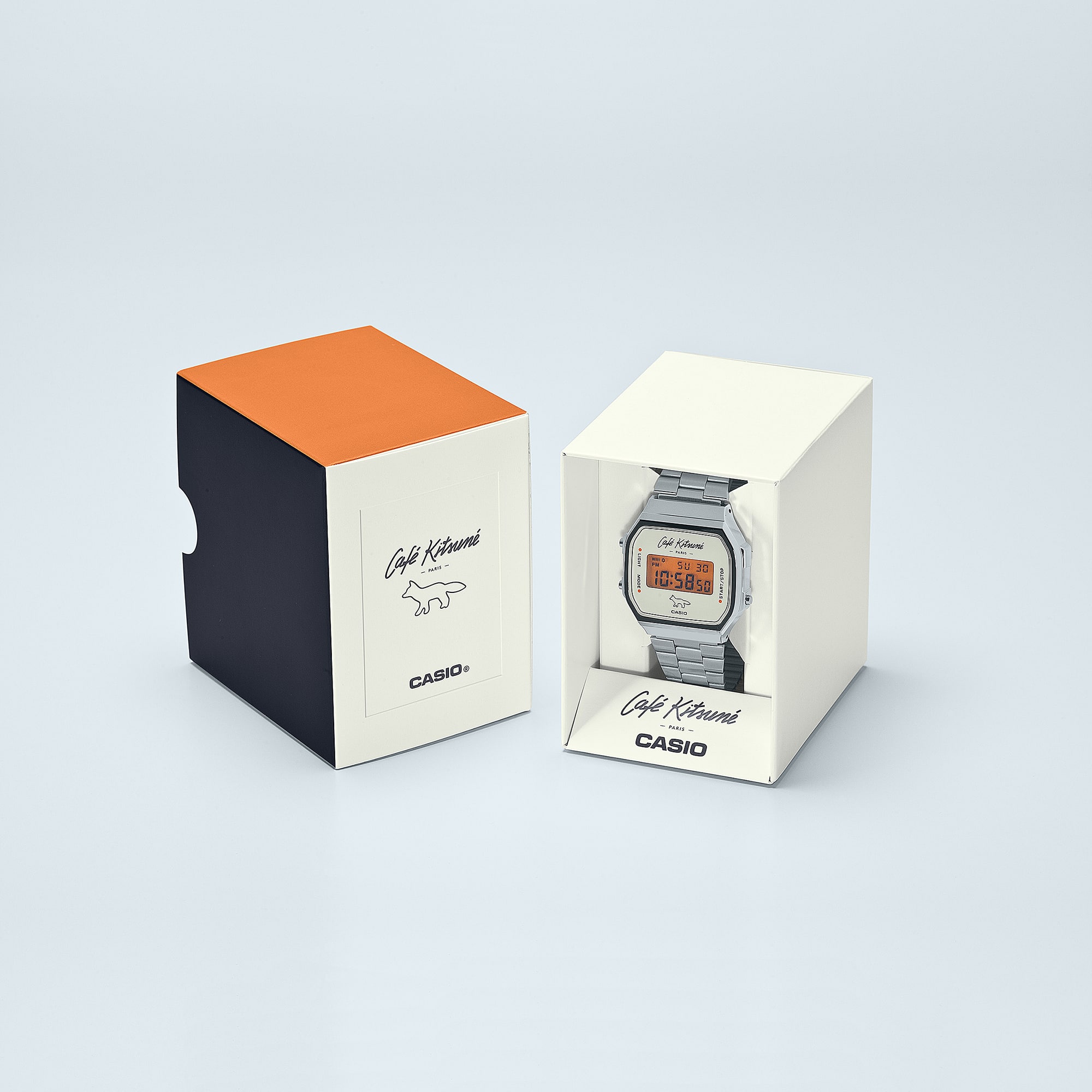 Embalaje del reloj Casio Vintage x Café Kitsuné en amarillo claro, negro y naranja