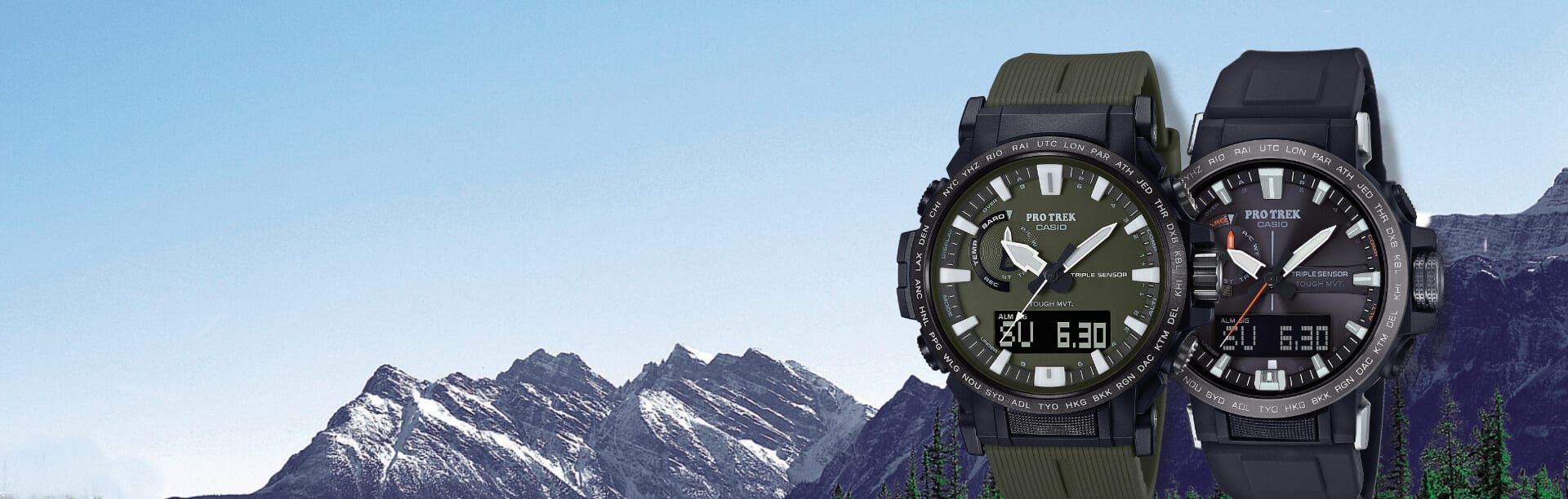 Dos relojes Pro Trek uno al lado del otro delante de una montaña al fondo