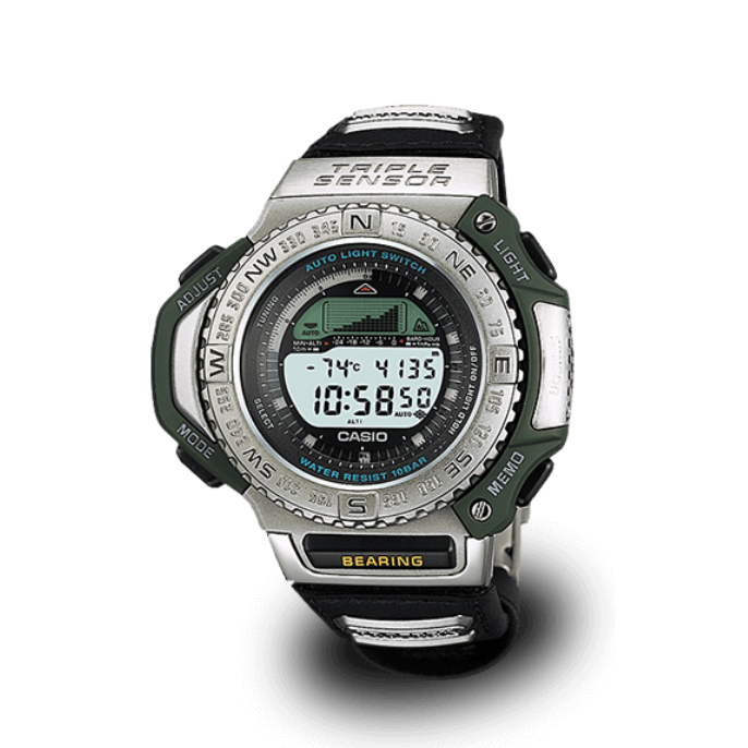 El reloj de pulsera digital PRT-1400 en gris/negro y verde oscuro con caja redonda, botón frontal y botones laterales.