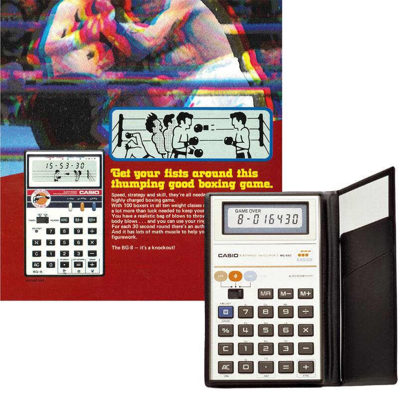 The game calculator in grey with a small display on top in front of the advertisement poster showing the boxing game