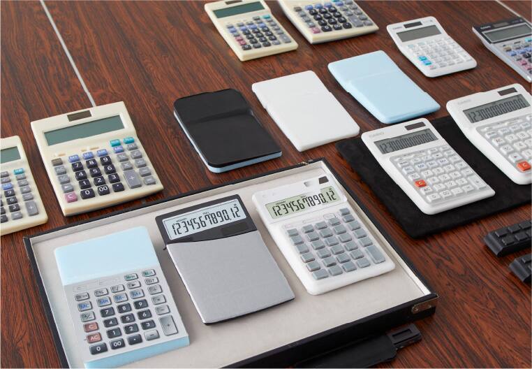 Several prototypes of the ergonomic calculator next to each other