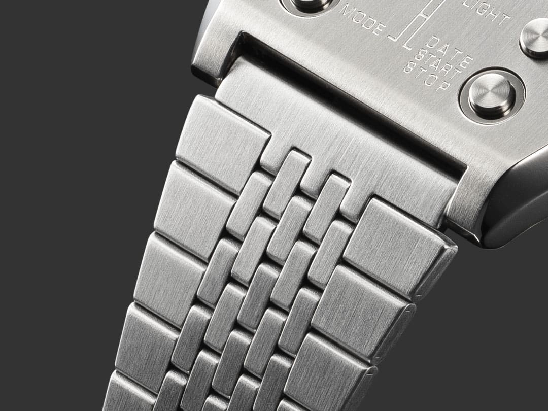 Close-up of the silver stainless steel wristband of the A1100D-1 wristwatch
