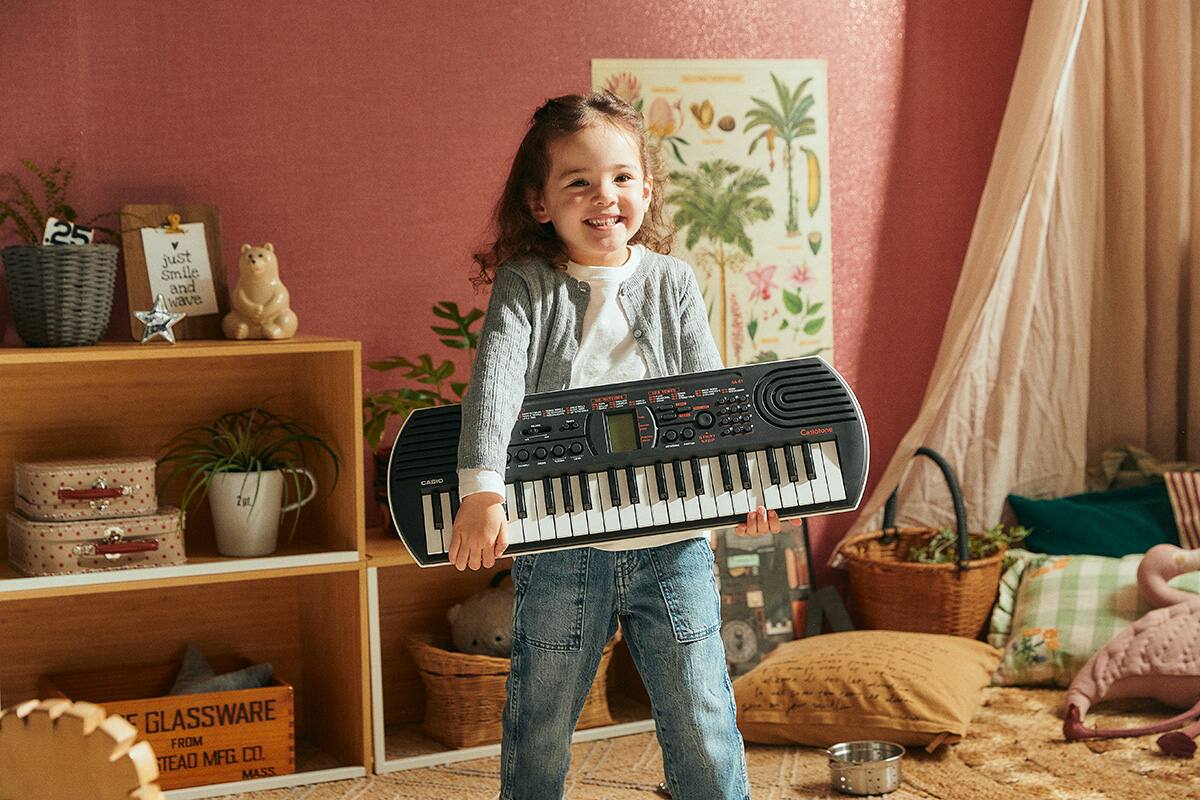 Little girl with SA-81 in her hands