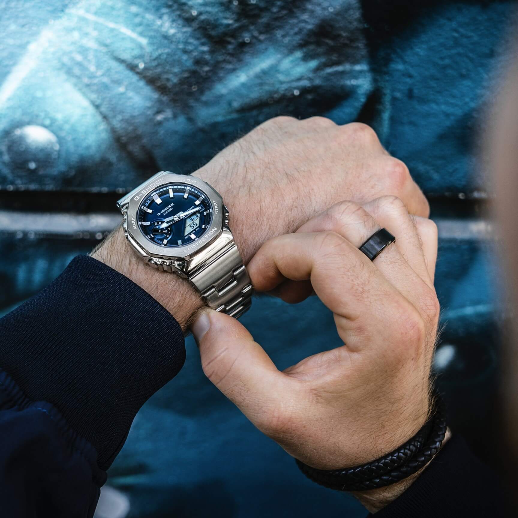 Wearing a G-SHOCK GM-2110D-2BER Full-Metal watch with dark blue bezel