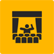 Black logo of a stage on a yellow background.
