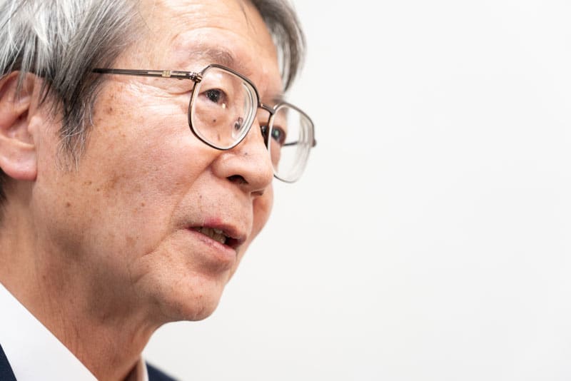 Portrait of Yoshino, the developer of the fx-7000G calculator