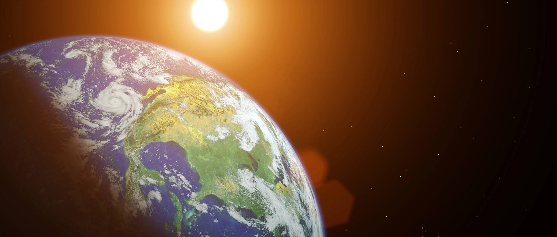 An image of the Earth with the sun in the background.