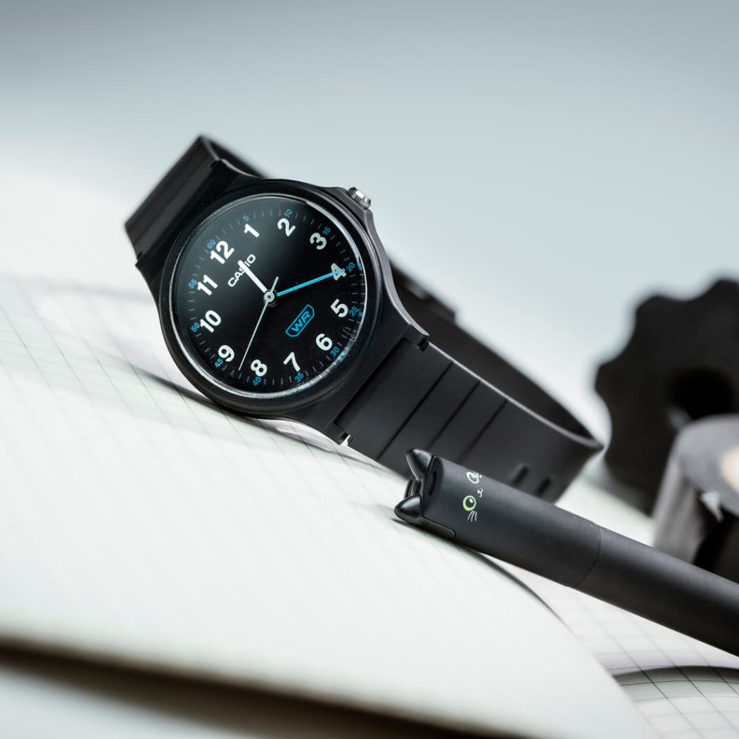 The Casio Timeless Collection wristwatch "LQ-241BEF" with black resin strap and black dial. The numbers on the watch are white and therefore easy to recognise.