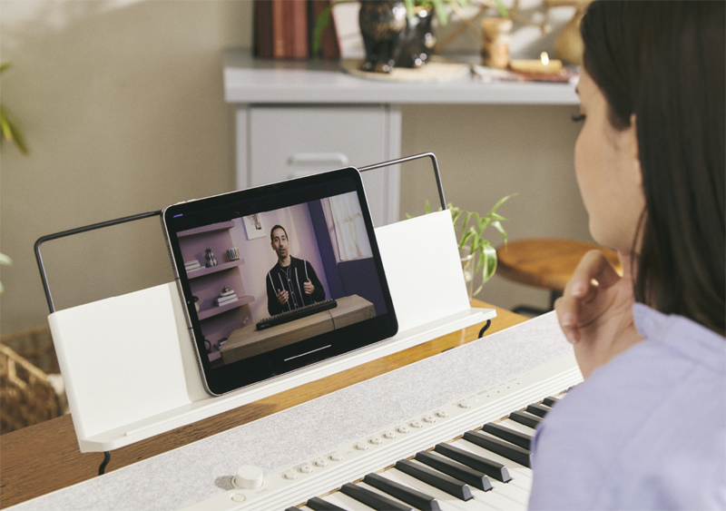 Image of a person watching the video on the app