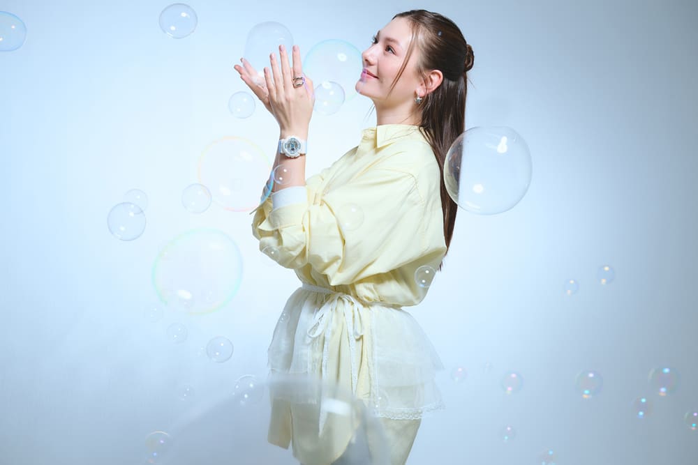 Full-body photo of a girl wearing the BA-110PD-2A on her wrist.