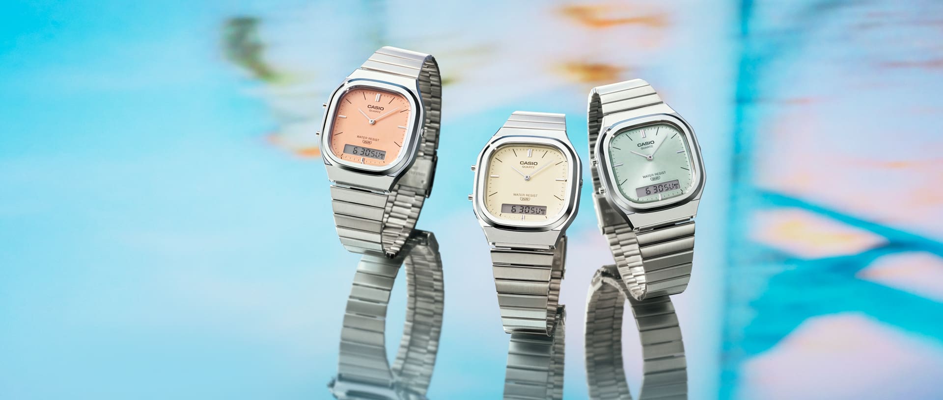 Image of the AQ-240E model watch in silver, blue, and gold