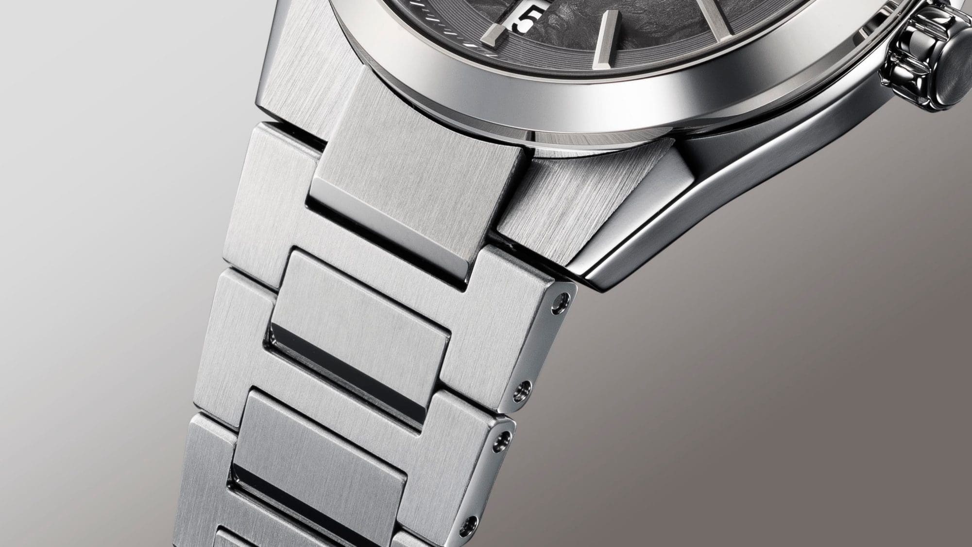 The finely satin-finished stainless steel bracelet with polished edges.