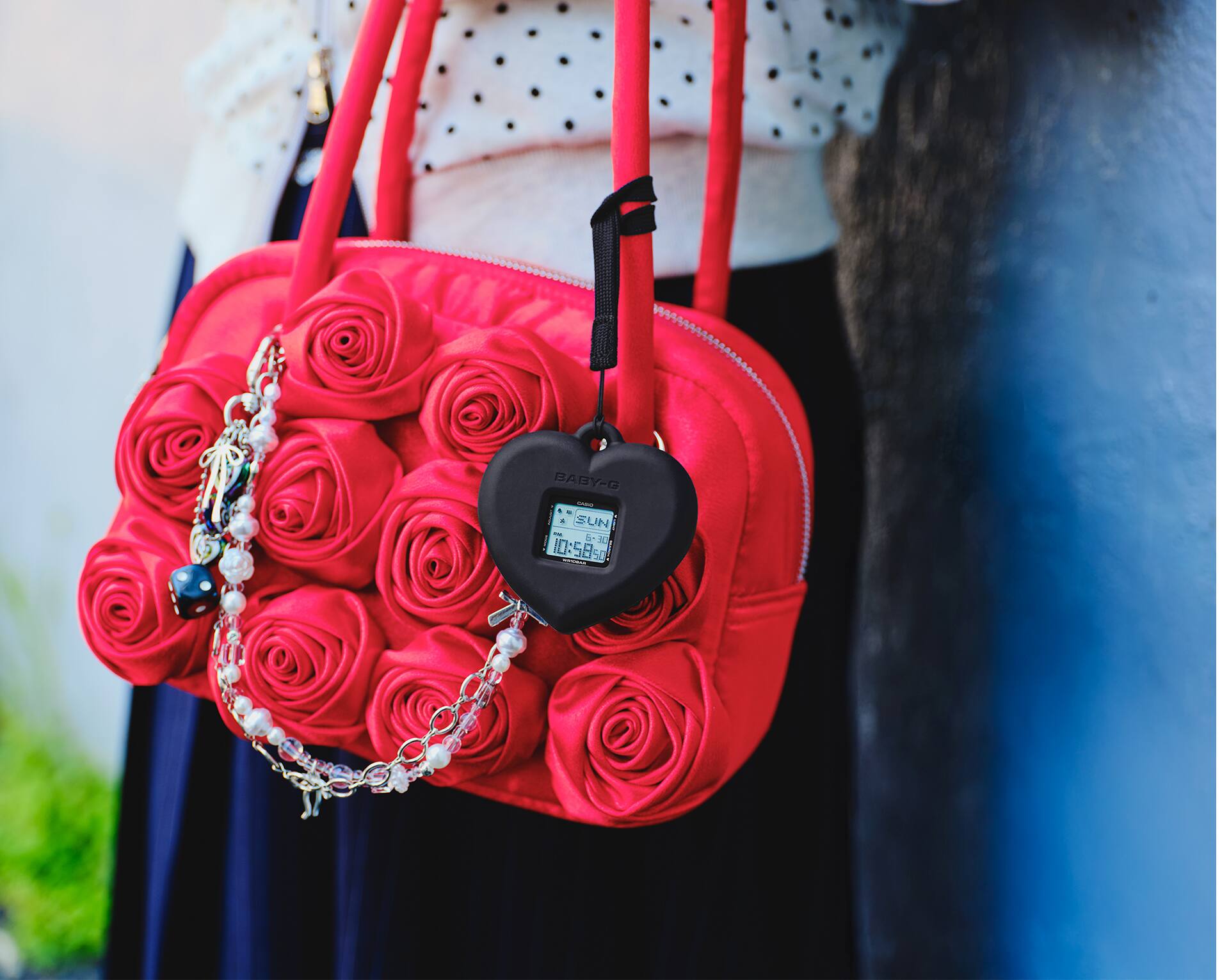 Photo of BGD-10KH-2B attached to a bag as a charm.