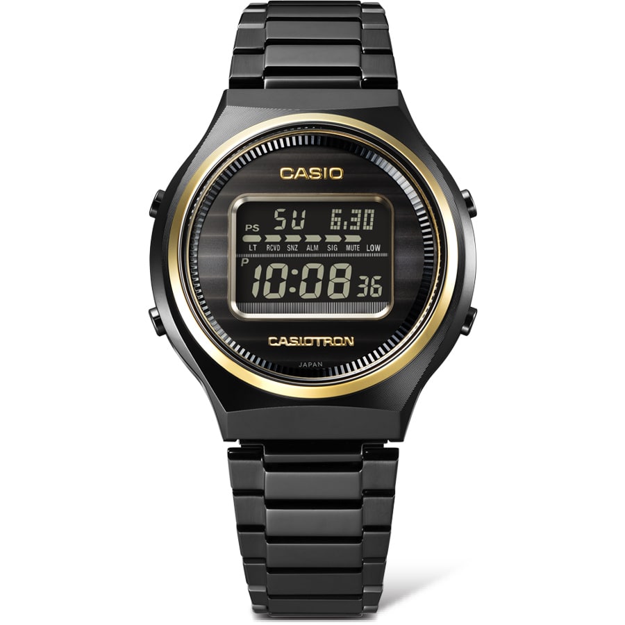 Het CASIOTRON TRN-50ZE-1A horloge met ronde kast en zwart-grijze armband en goudkleurige details in het digitale display