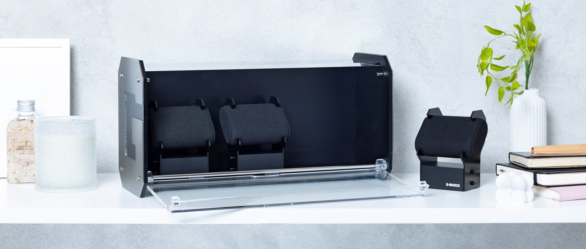 Empty Watch Mounts sits on a white shelf