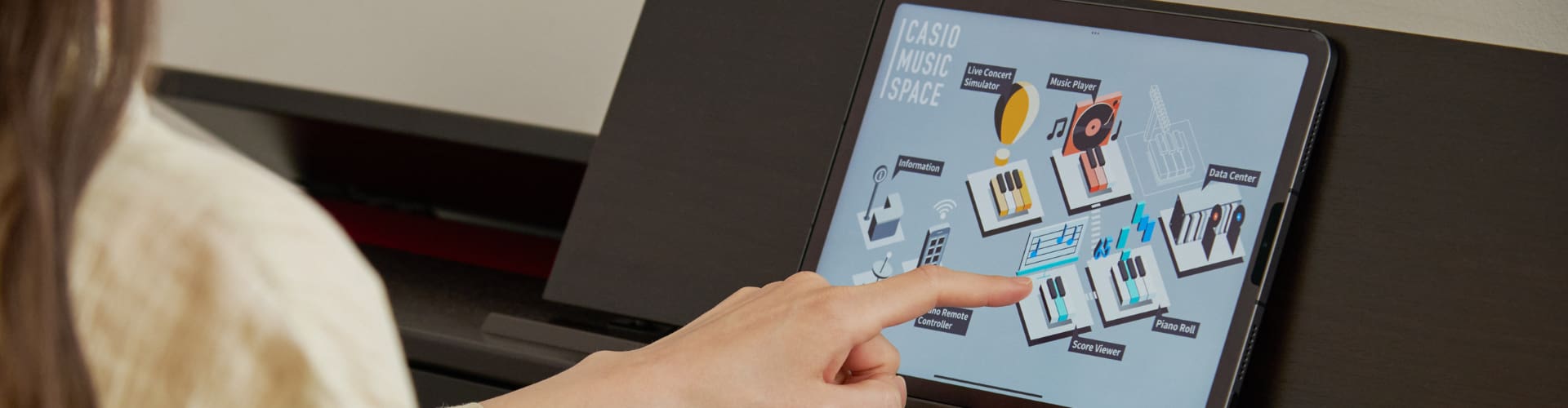 A woman plays on the Casio CDP-S100