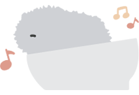 An illustration of a silver-colored Moflin relaxing in its own bed.