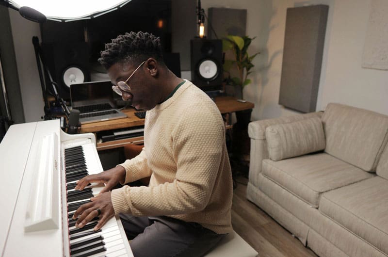 Dion Todman playing keyboard