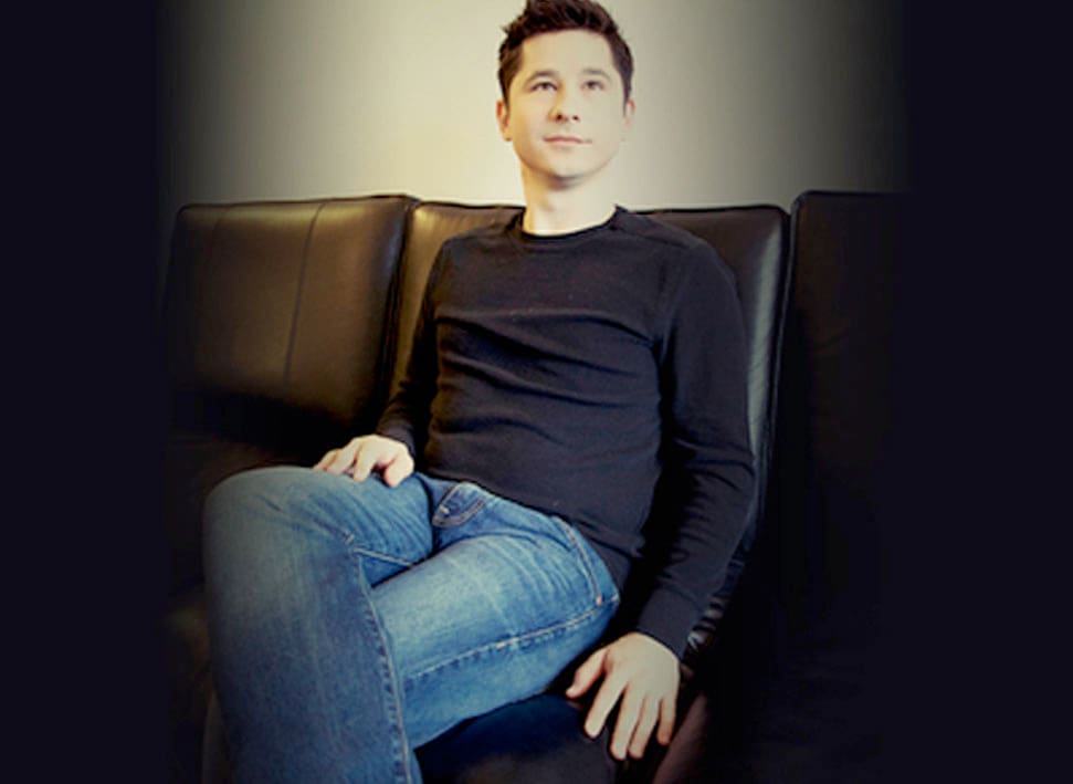Eldar Djangirov Headshot On Couch 