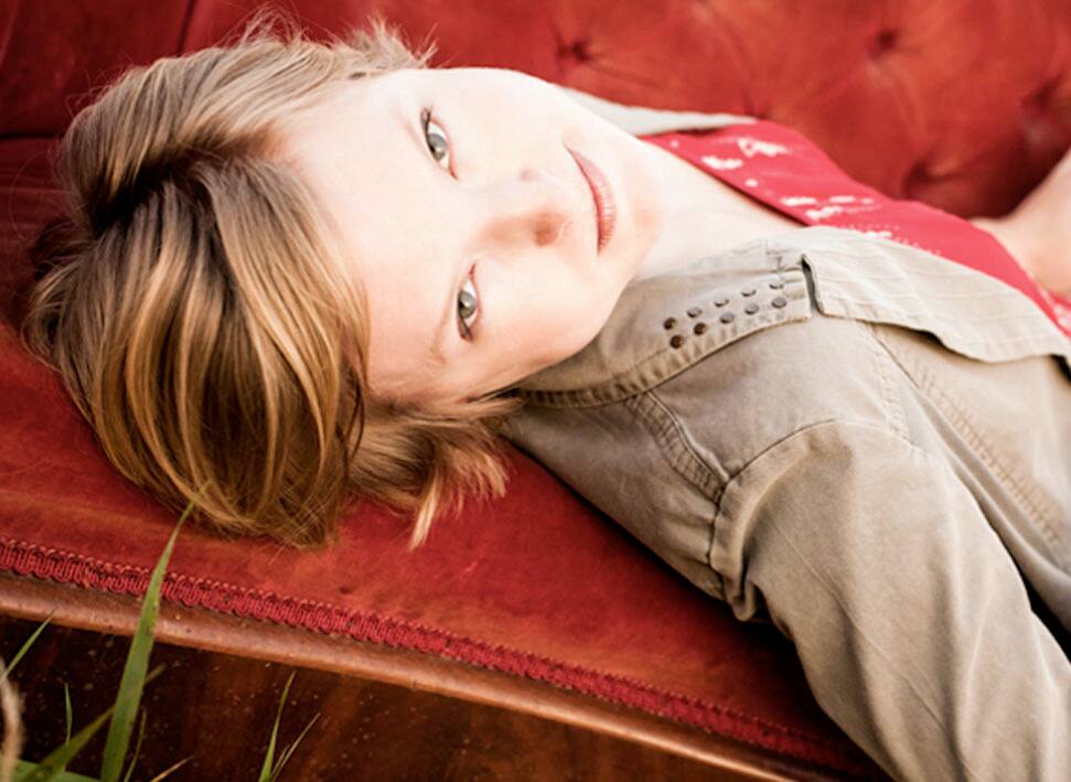 Laura Clapp Davidson Headshot Laying Down