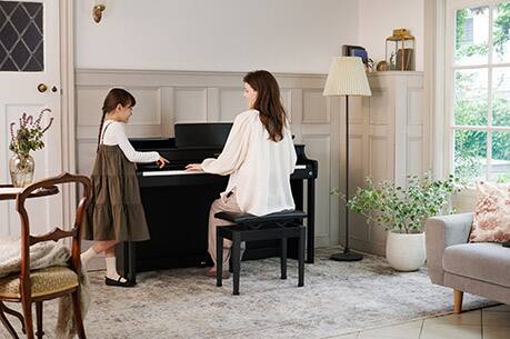 CELVIANO AP-300BK Being observed by a child while played