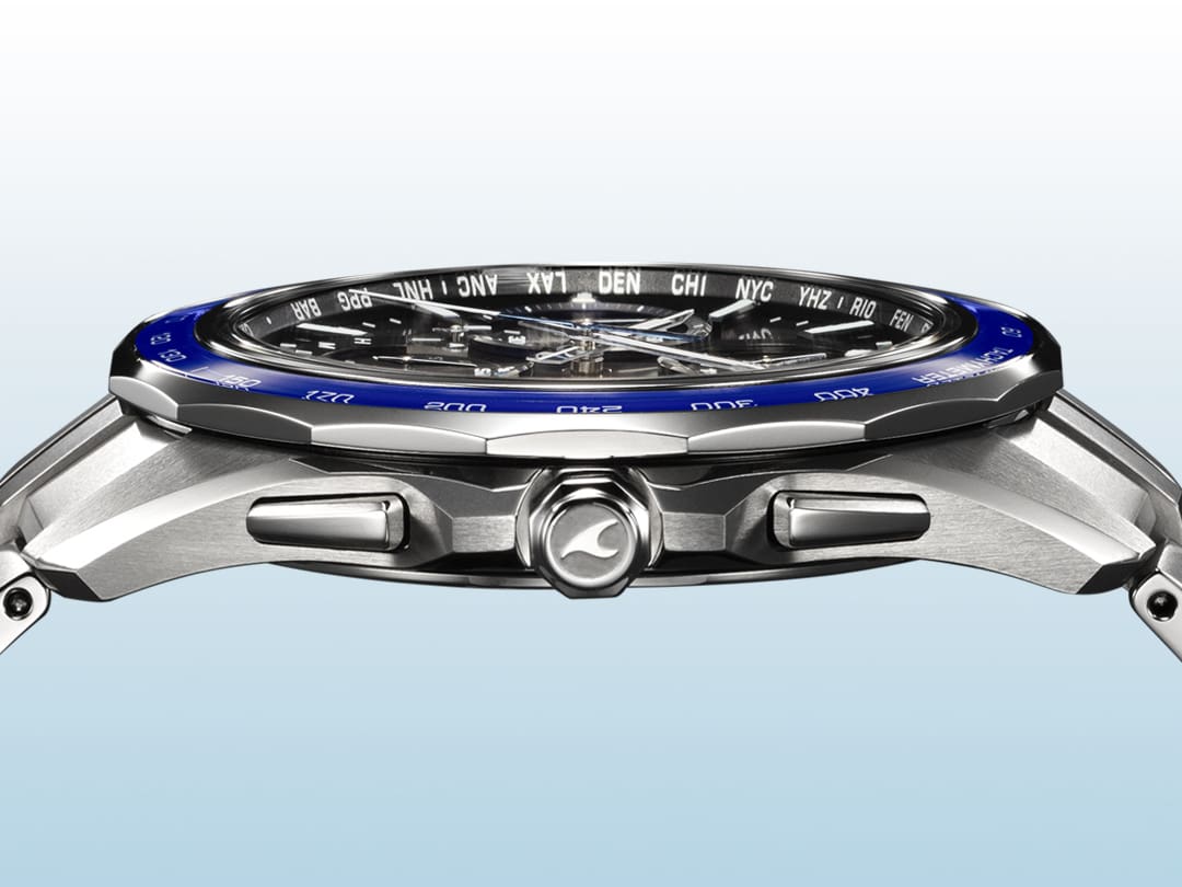 Casio EDIFICCasio Oceanus OCWS7000 series luxury watch seen side-on denoting a thin caseE EFSS641TMS-1A motorsports watch amidst a race car denoting style