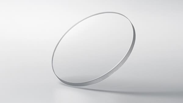 Sapphire crystal disc with non-reflective coating Sapphire crystal disc with non-reflective coating