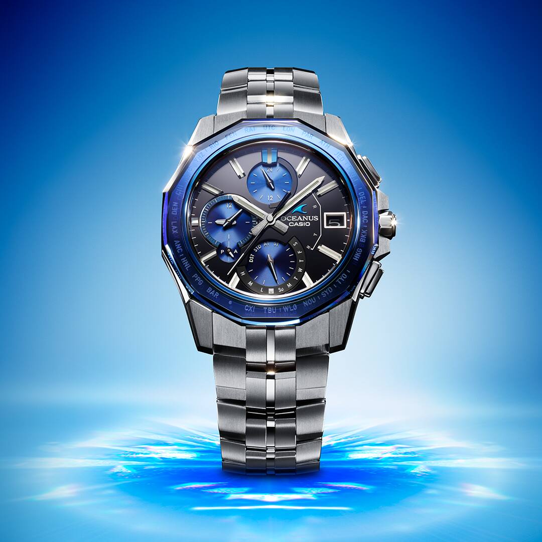 Casio OCEANUS  OCWS6000-1A  affordable luxury  watch amidst blue  lighting effects and  background denoting  style.