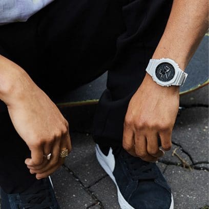 G-SHOCK Analog Digital GA-2100-7A White with Black Dial Watch on wrist denoting style