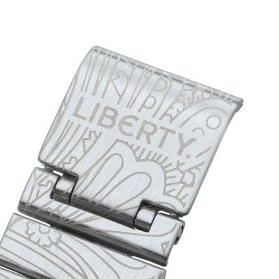 LIBERTY is written on the clasp of the AQ-230ELT-7AER framed by the paisley pattern