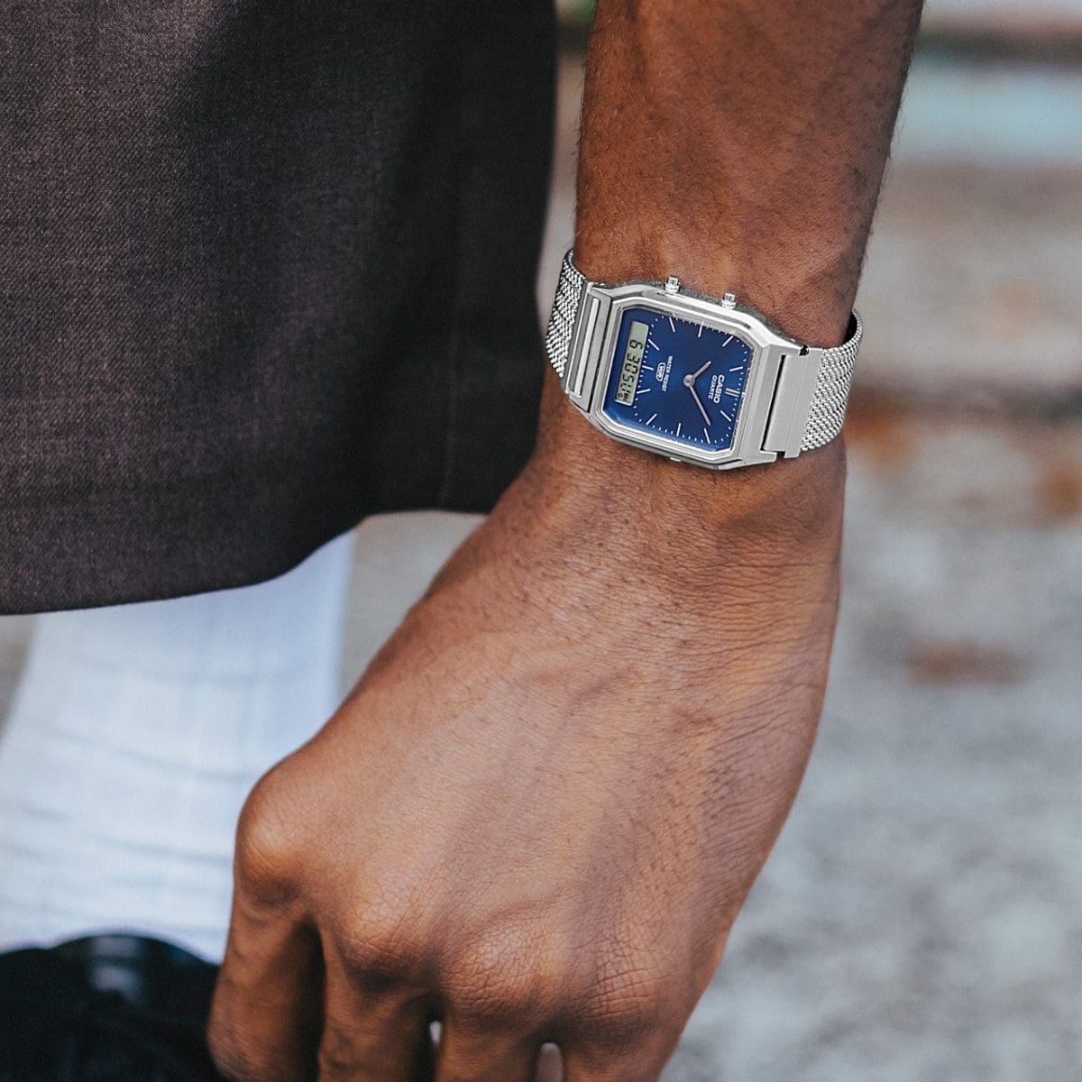A man is wearing the AQ-230EM-2AEF on his wrist.