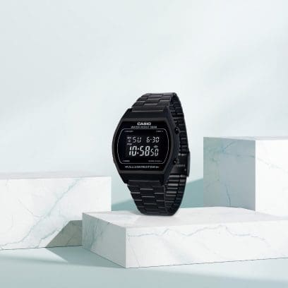 The black digital watch ‘B640WB-1B’ on a marble-like pedestal
