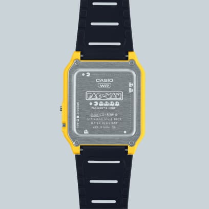 Back of the calculator watch CA-53WPC-1B including a Pacman engraving