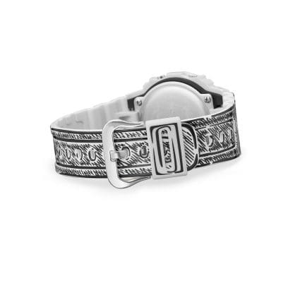 Rear view of the DW-5600JV-7 wristwatch with closed strap and silver metal clasp.