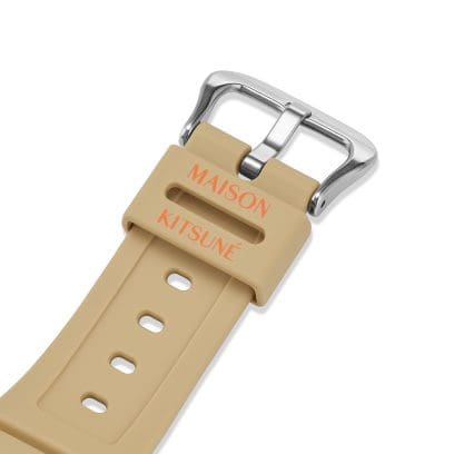 The name Maison Kitsuné is printed on the GA-2110MK-5AER's webbing loop.