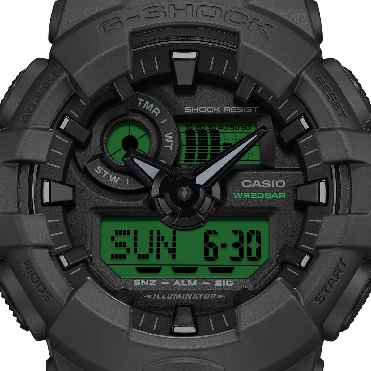 Close-up of the analog-digital dial of the G-SHOCK GA-700BEG-1AER wristwatch with green digital display and black dial.