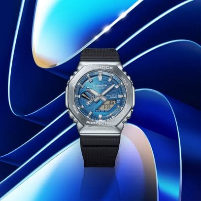 Front view of the GBM-2100A-2BER against a background of round shapes in different shades of blue