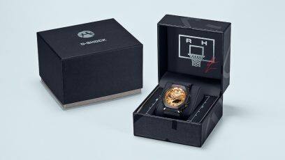 The G-SHOCK hybrid watch GBM-2100RH-1A in its black packaging box