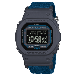 Front view of the G-SHOCK digital watch GW-BX5600CBG-2ER with dark blue case and fabric strap