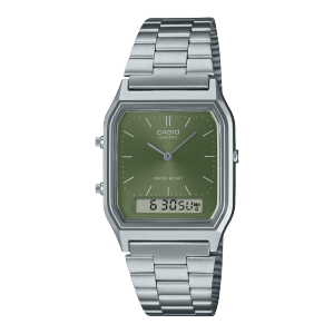Montre Casio vintage avec bracelet métallique argenté et lunette analogique vert foncé.