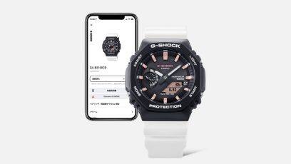 GA-B2100CD-1A7 à côté d'un smartphone sur lequel on peut voir l'application CASIO Watches.