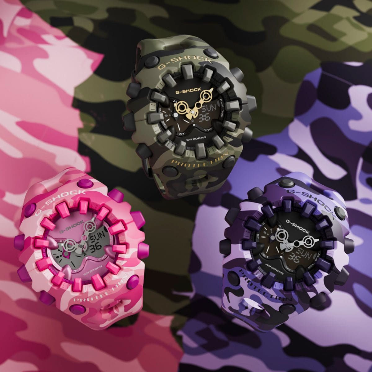 Trois variantes de couleur de la série camouflage GA-V01 côte à côte : rose, vert et violet.