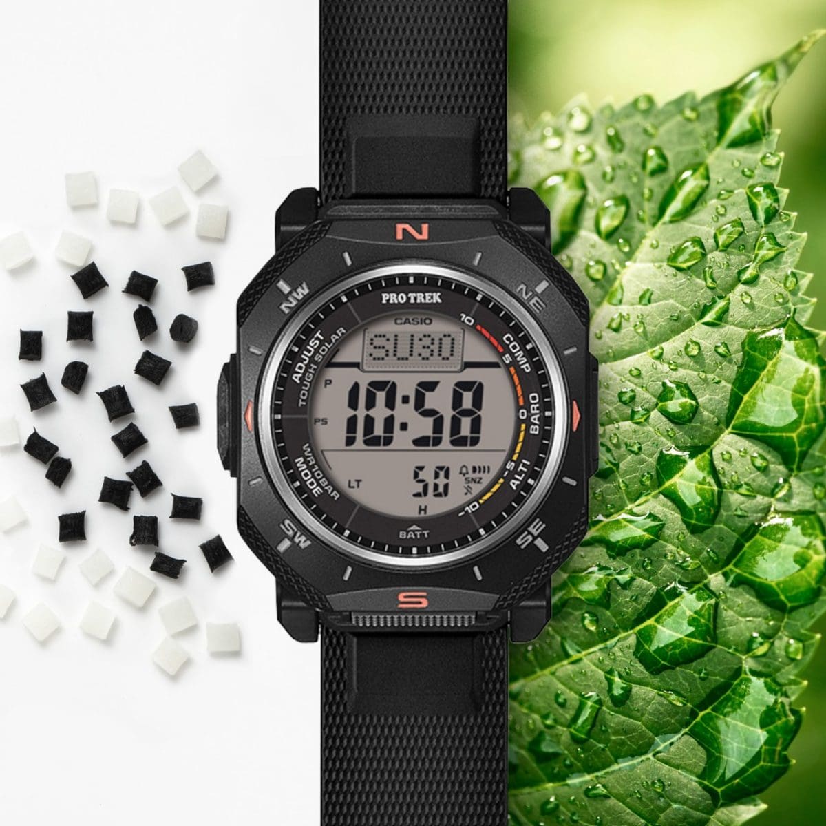 À côté de la PRO TREK PRG-69-1 se trouvent les billes de résine, matière première utilisée pour la fabrication, et de l'autre côté, une feuille verte avec des gouttes d'eau est représentée.