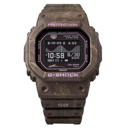 As inscrições «G-SHOCK» e «PROTECTION» na caixa do relógio de pulso GBX-H5600KI-5ER são na cor lavanda