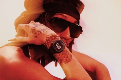 Man wearing a DW-5600UBB-1 in an expressive pose