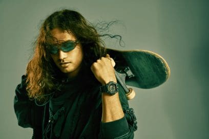 Man wearing a DW-6900CF-1 in an expressive pose